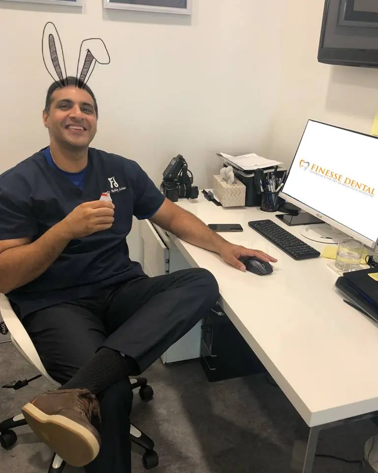 easterbunny Dr Robby Sehmi - wears drawn bunny ears while smiling