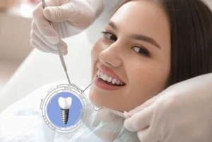 Smiling woman at dental clinic receives examination. Gloved hands hold dental tools near her mouth
