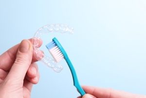 Cleaning,Plastic,Aligner,Aligners,With,A,Toothbrush