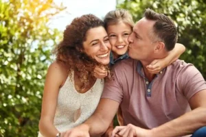 A joyful family enjoying a moment together outdoors