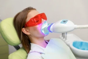 Patient undergoes a permanent teeth whitening procedure