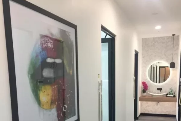 Hallway going to vanity area